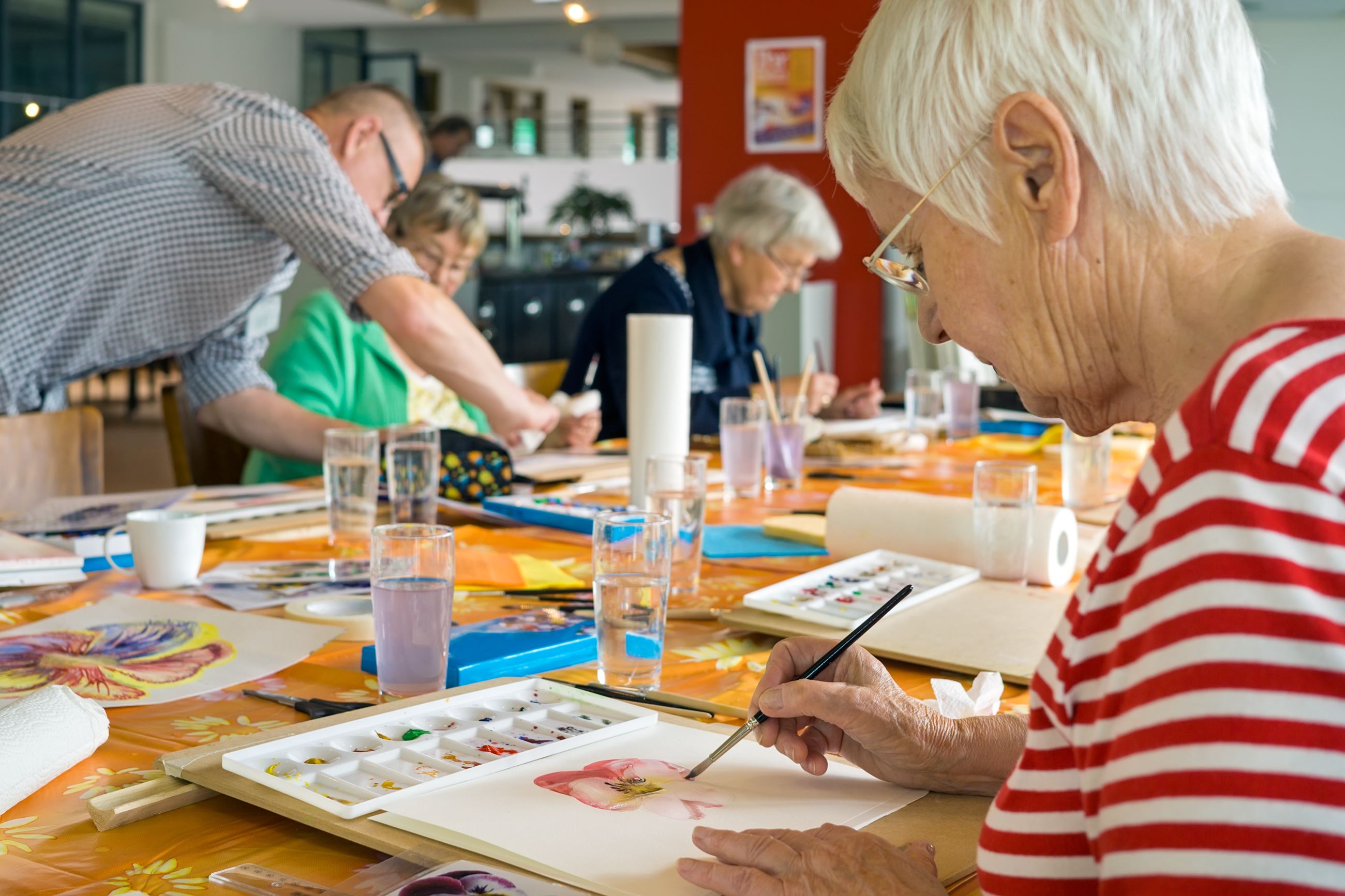 older adults in painting class