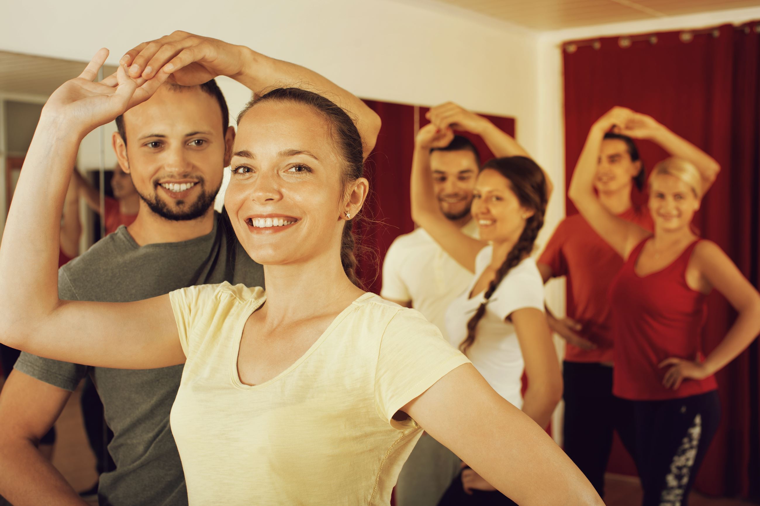 Adult couples in a dance class